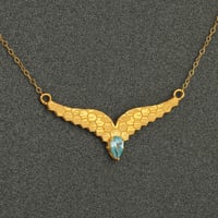 طقم ذهب جناح مع فص فيروزي ( عيار 21 )