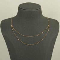 عقد كرات الذهب المتباعدة دورين ( عيار 21 )