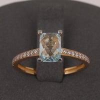 خاتم ذهب سولتير بفص سماوي ( عيار 18 )