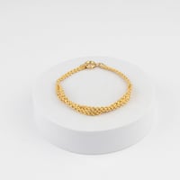 طقم ذهب الضفائر المبرومة (عيار 18)