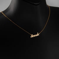 تصميم اسمك من الذهب الخالص (عيار 21)