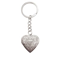 نحت صورة داخل ميدالية قلب يمكن فتحها - فضي