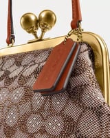 شنطه كوتش - Crystal Signature Jacquard Kisslock