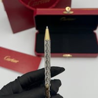 قلم كارتييه فضي و ذهبي