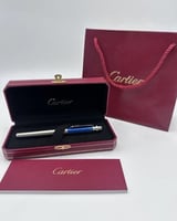 قلم كارتييه ازرق وفضي