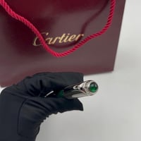 قلم كارتييه اخضر وفضي