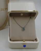 سلسال بوشرون فضي بجوهرة سماويه