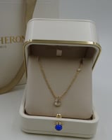 سلسال بوشرون ذهبي بجوهرة شفافه