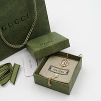 سوارة قوتشي ذهبي دائرية