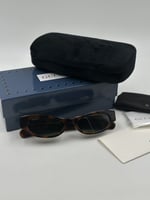 نظارة قوتشي بنيه