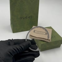 سوارة قوتشي فضي حديد عريضه