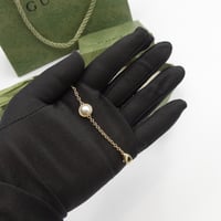 سوارة قوتشي ذهبي دائرية