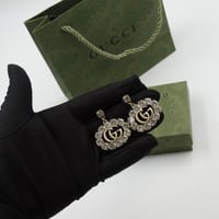 حلق قوتشي ذهبي