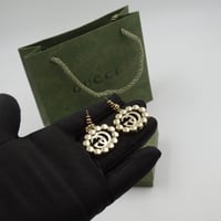 حلق قوتشي ذهبي