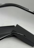 نظارة سان لوران سوداء بشعار فضي