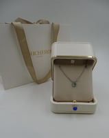 سلسال بوشرون فضي بجوهرة سماويه