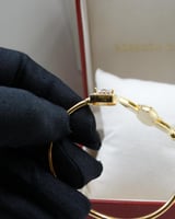 سوارة روبرتو كوين معصم ازرق و ذهبي