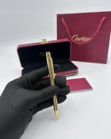 قلم كارتييه ذهبي كامل