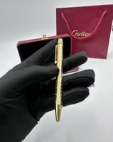 قلم كارتييه ذهبي كامل