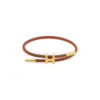 سوارة إيرميز لون احمر و ذهبي