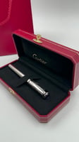 قلم كارتييه لون فضي