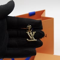 حلق لويس فيتون ذهبي