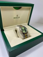 ساعة رولكس لون أخضر