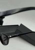 نظارة سان لوران سوداء بشعار فضي