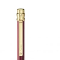 قلم كارتييه عودي وذهبي