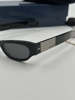 نظارة قوتشي سوداء باطراف فضيه