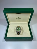 ساعة رولكس لون أخضر