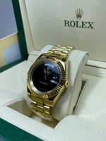 ساعة رولكس لون ذهبي