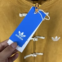 جاكيت اديداس