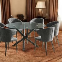 طاولة طعام زجاج بقاعدة كروم اسود 6 كراسي