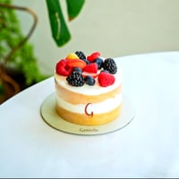 كيكة جاناش مع باقة ورد منوع