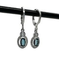 اقراط لندن توباز