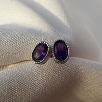 اقراط امثيست