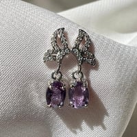 اقراط امثيست