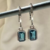 اقراط لندن توباز