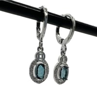 اقراط لندن توباز