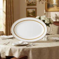 صحن سرفيس رز بورسلان ابيض وذهبي بنقشات ناعمة بيضاو...