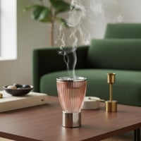 مبخرة زجاج مخطط وردي بقاعدة وغطاء معدن استيل لماع...