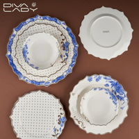 طقم عشاء بورسلان ابيض فاخر نقشة منقط مزهر ازرق 24...