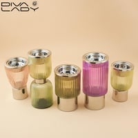 مبخرة زجاج مخطط وردي بقاعدة وغطاء معدن استيل لماع...