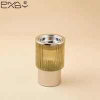 مبخرة زجاج مخطط اخضر بقاعدة وغطاء معدن استيل لماع...