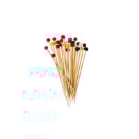 اعواد تمر خشب ملون مع كاسة زجاج