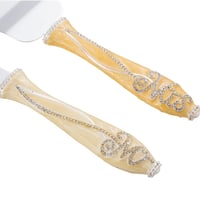 جاروف مع سكين لتقطيع الكيك فضي