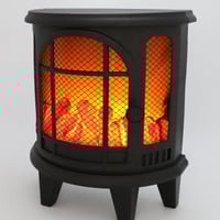 ديكور انارة على شكل مدفأة