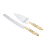 جاروف مع سكين لتقطيع الكيك