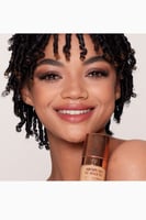 شارلوت تلبوري كريم أساس ايربراش فلوليس درجة 9 وورم...